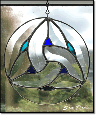 Celtic Knot-beveled stained glass suncatcher by Sam Davis 2023